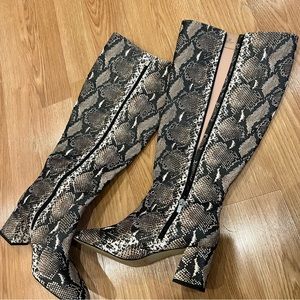 Knee high snake skin print zip up boots !!
